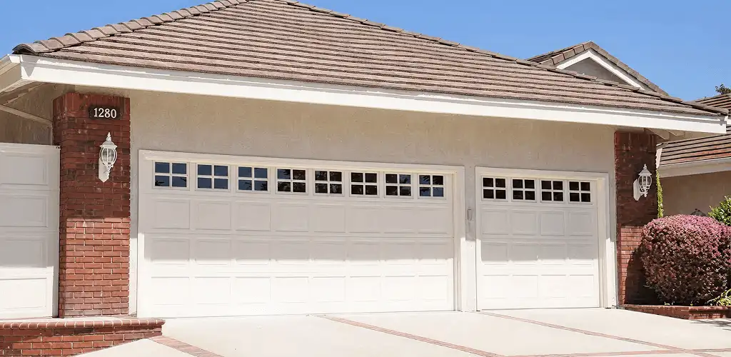 Residential garage door repair service for a double garage door in Indianapolis, IN
