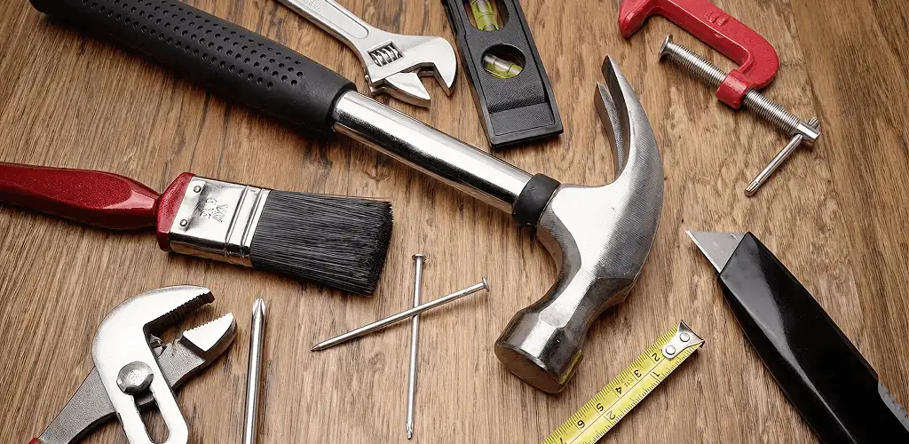 Handyman tools laid out for home repair and maintenance work in Indianapolis, IN